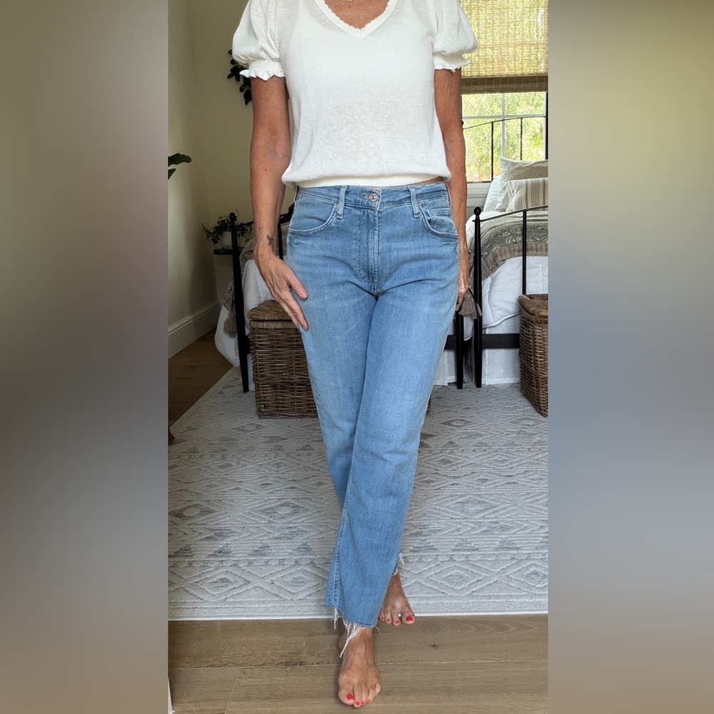 Citizens of Humanity Isola straight jeans light wash distressed hem.